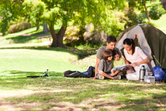 Joyful family camping