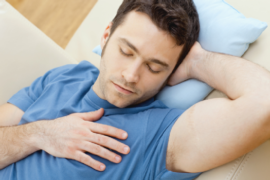 Man sleeping on couch