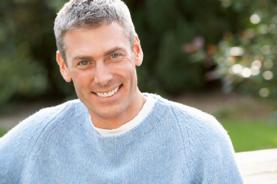 Portrait Of Man Standing Outside