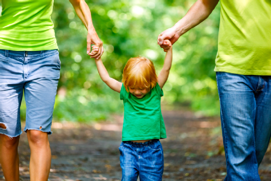 Portrait of Happy Family In Park